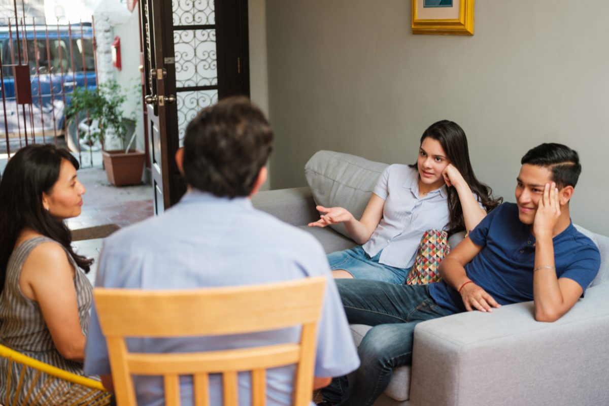 children speaking with parents